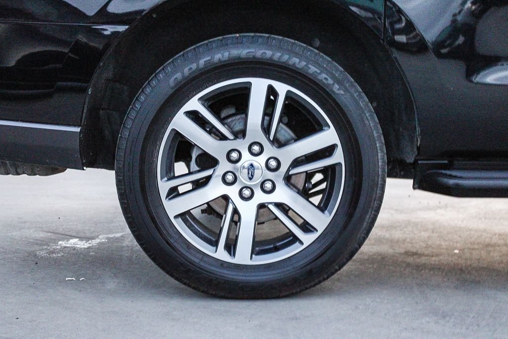 Used 2024 Black Metallic Ford Limited image 12