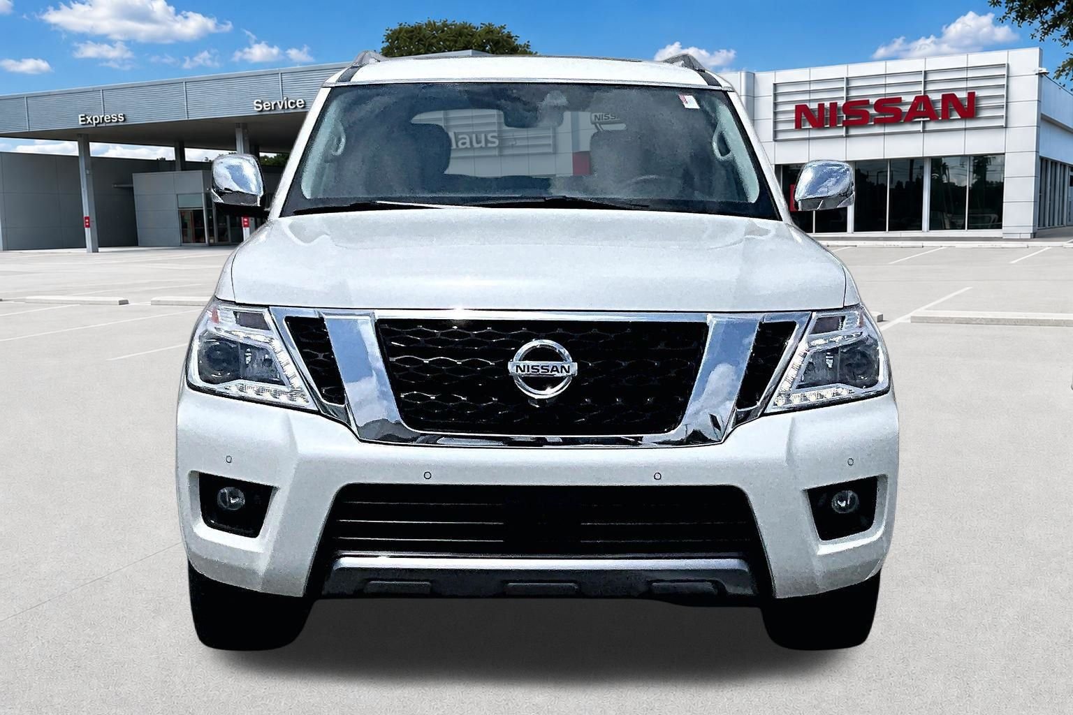 Used 2019 Pearl White Nissan Platinum image 4