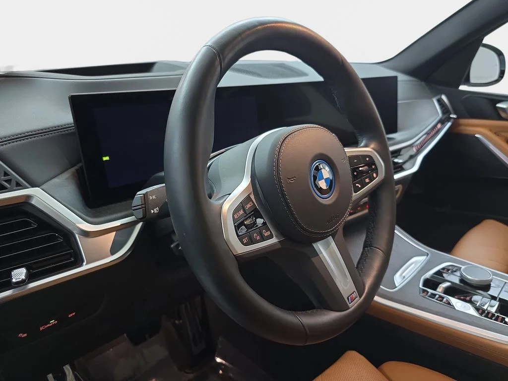 Used 2024 Mineral White Metallic BMW xDrive50e image 16