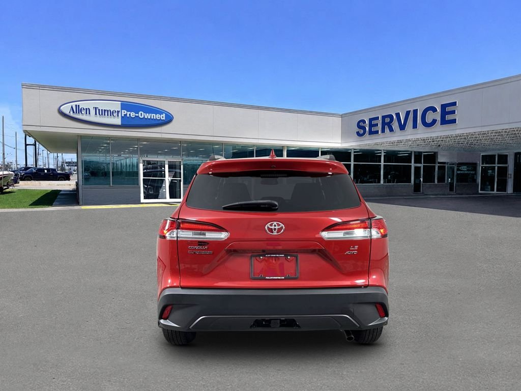 Used 2024 Barcelona Red Metallic Toyota LE image 7