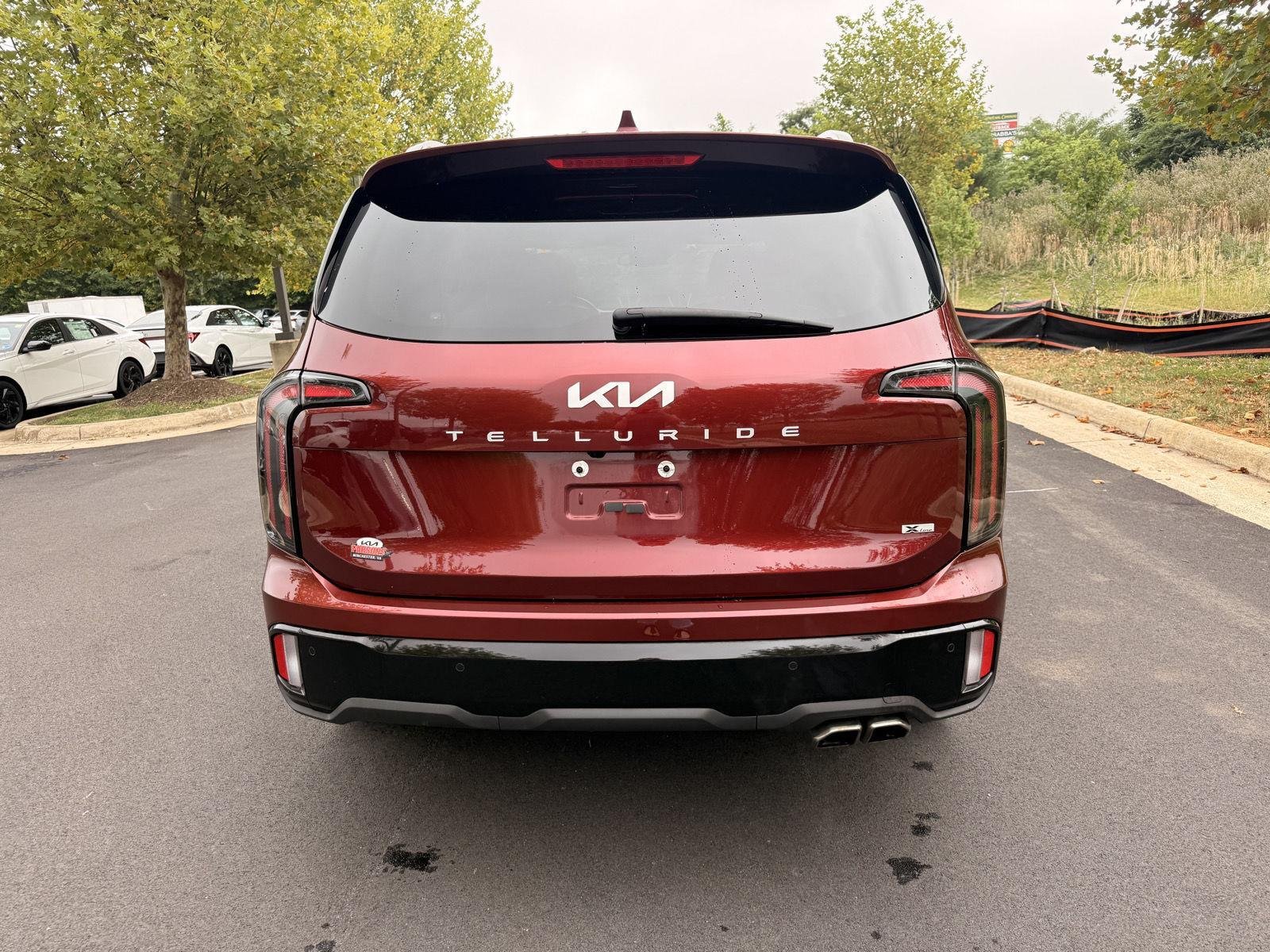 Used 2024 Dawning Red Kia EX X-Line image 6