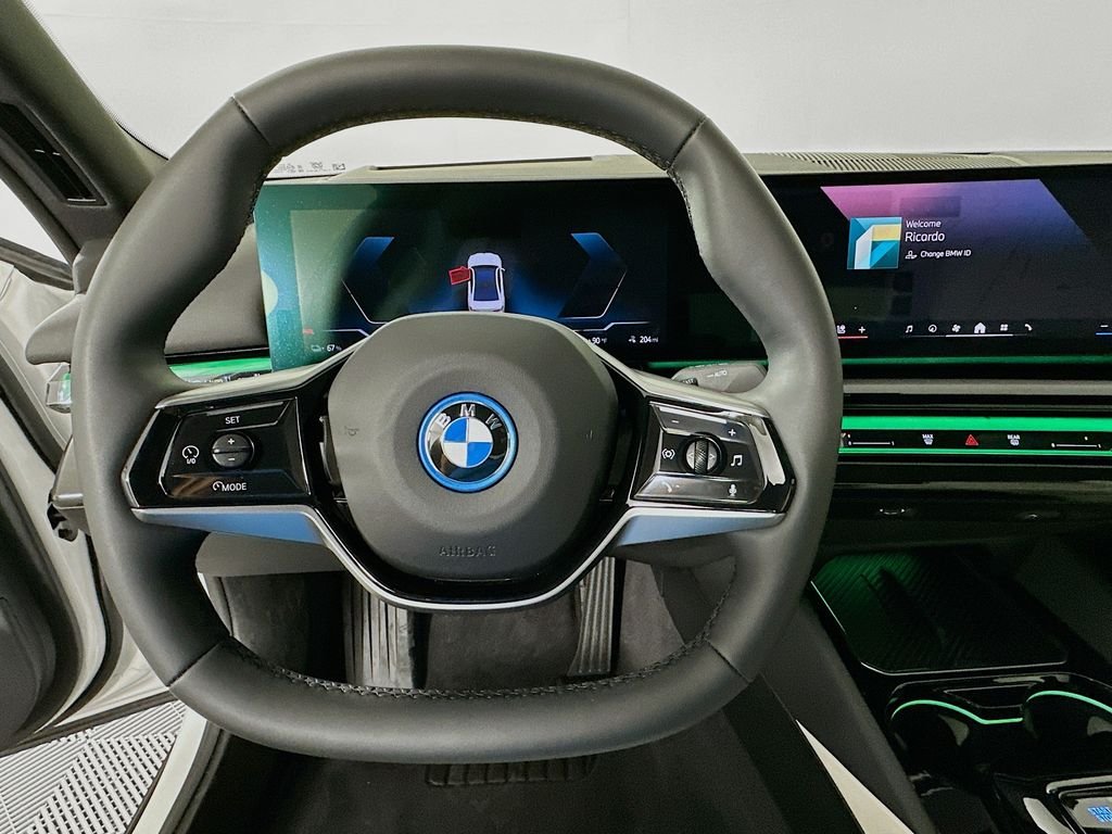 Certified Used 2025 Mineral White Metallic BMW eDrive40 image 11