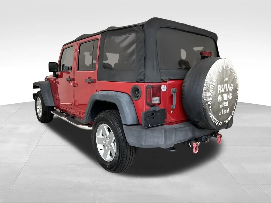 Used 2014 Red Jeep Unlimited Sport image 3