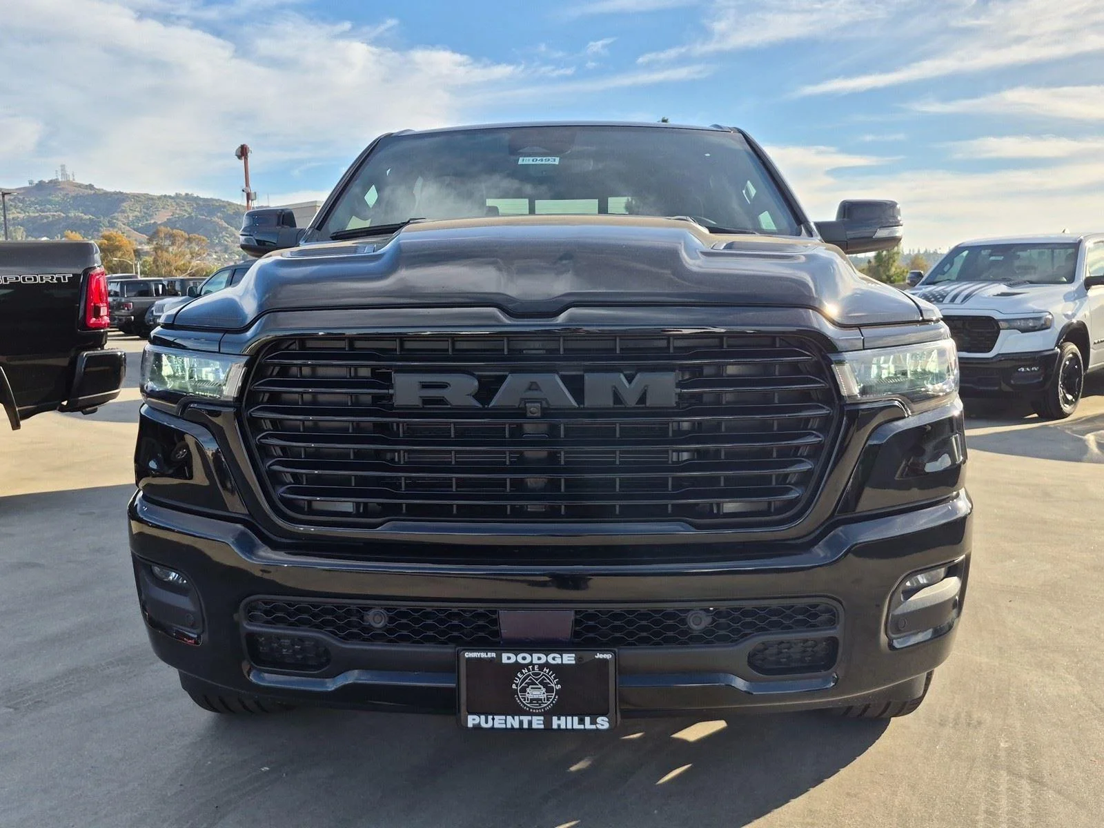 New 2026 Diamond Black Crystal Pearl-Coat Exterior Paint RAM Laramie image 2