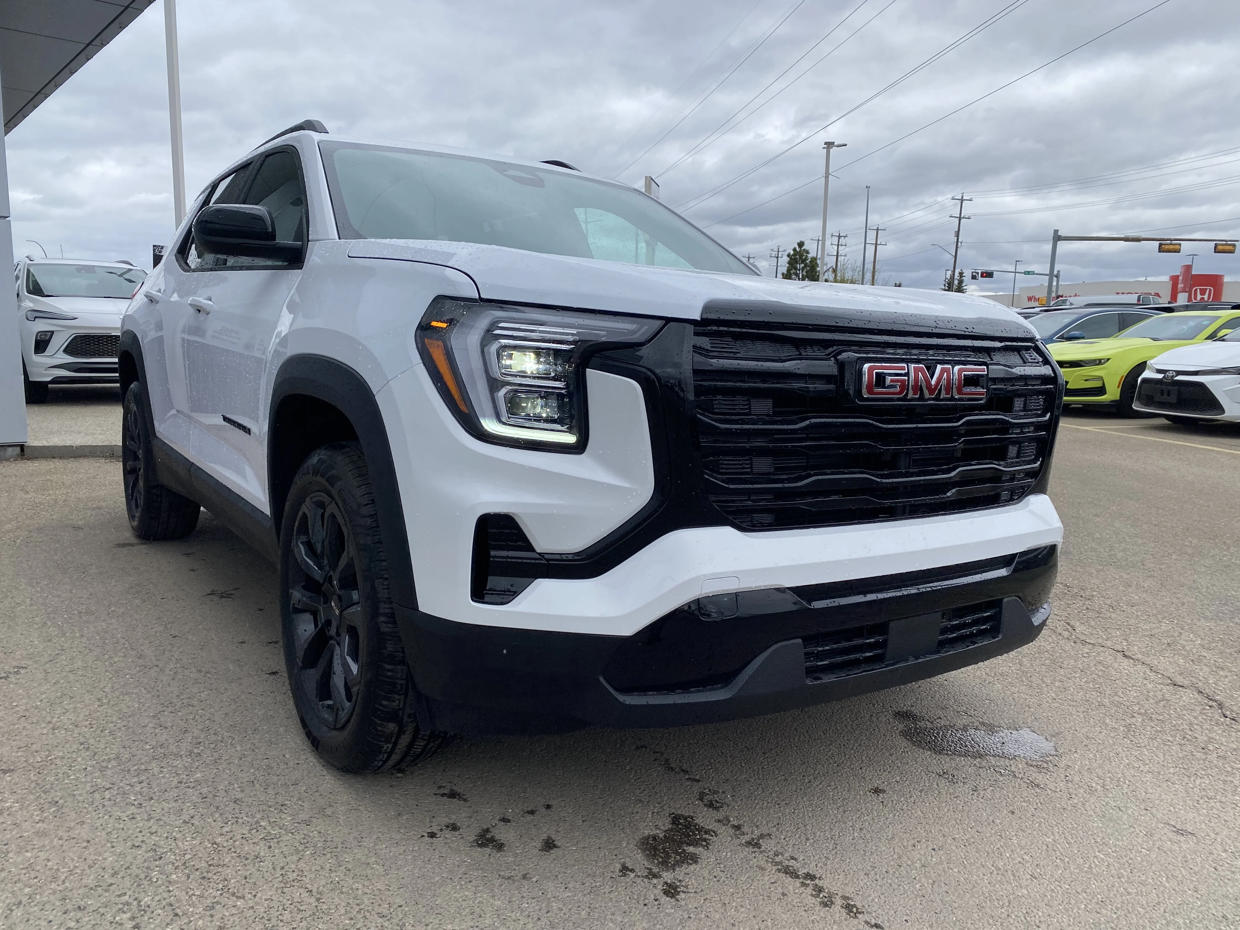 New 2026 Summit White GMC AWD Elevation image 8