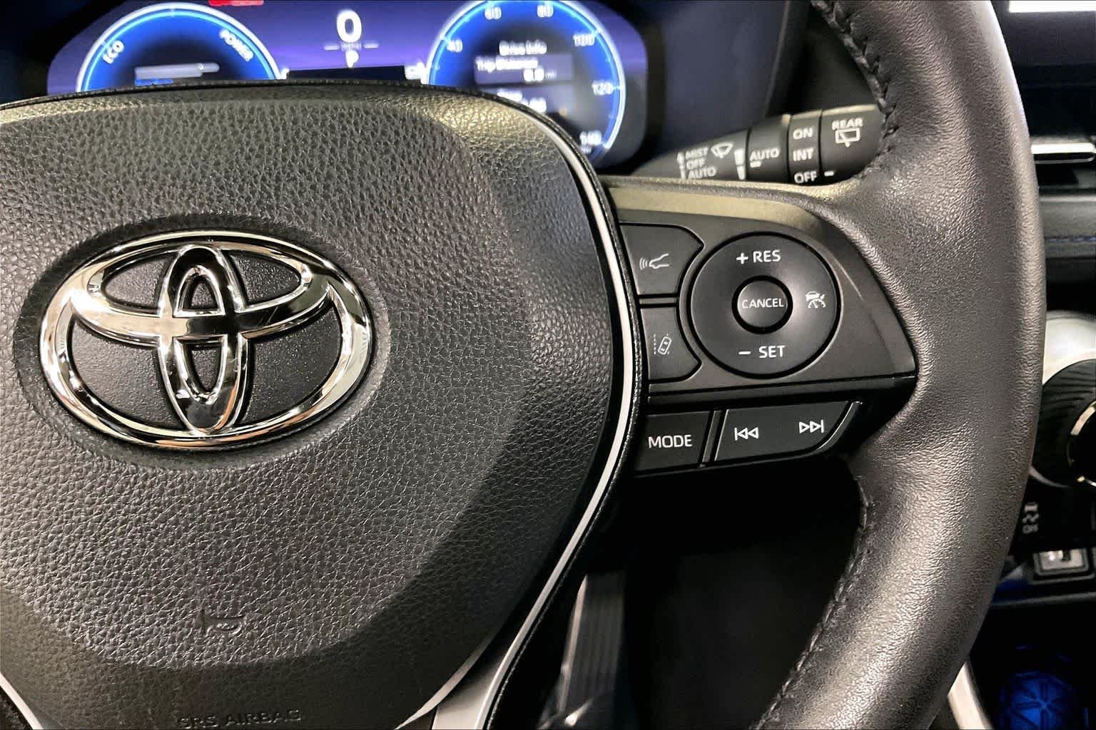 Used 2023 Cavalry Blue/Midnight Black Metallic Toyota Hybrid XSE image 25