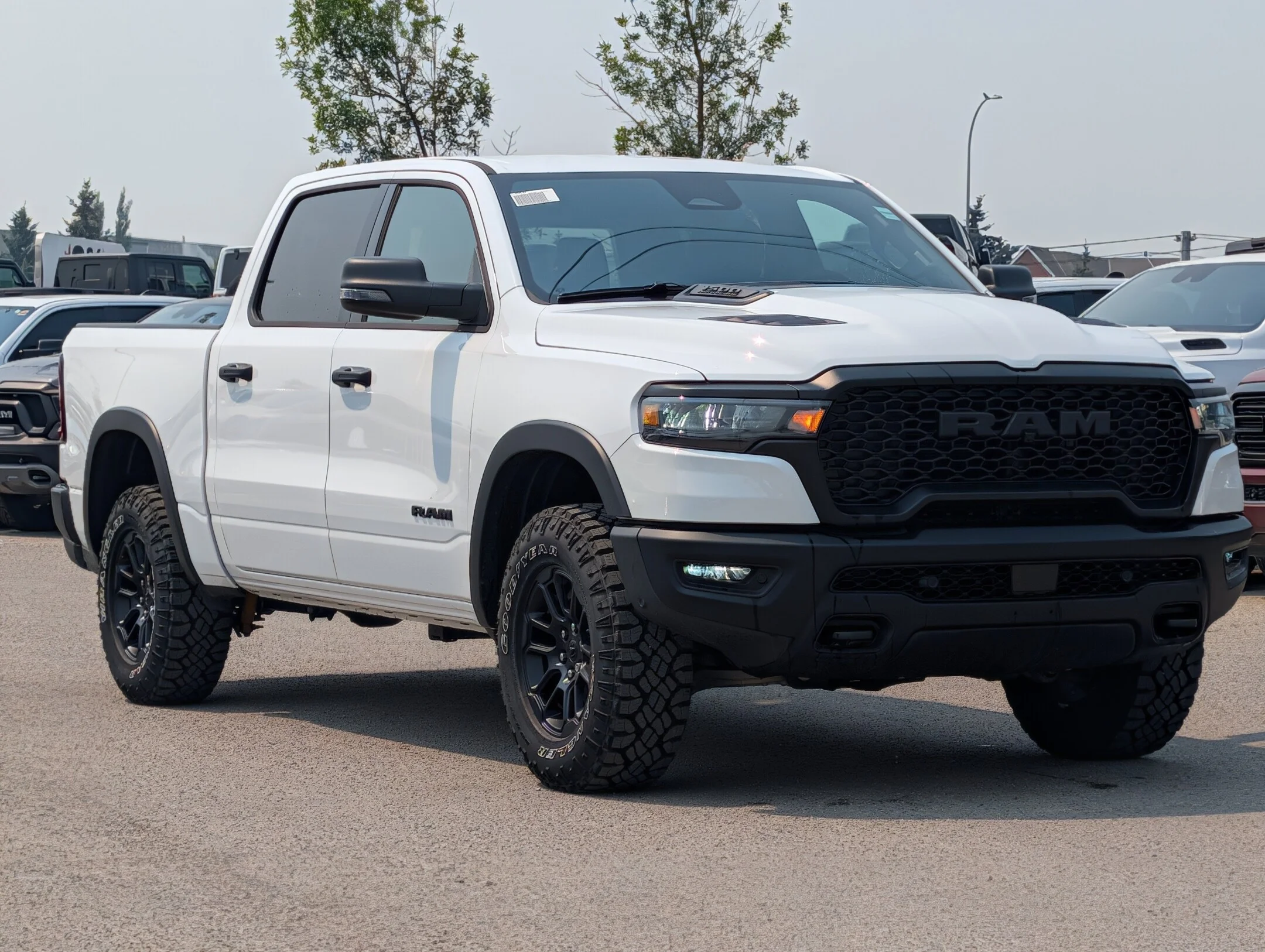 New 2026 White RAM Rebel - - Level 1 Grp - 2LEVEL- A/T TIRES/RIMS- SIDE STEPS AND MORE image 2