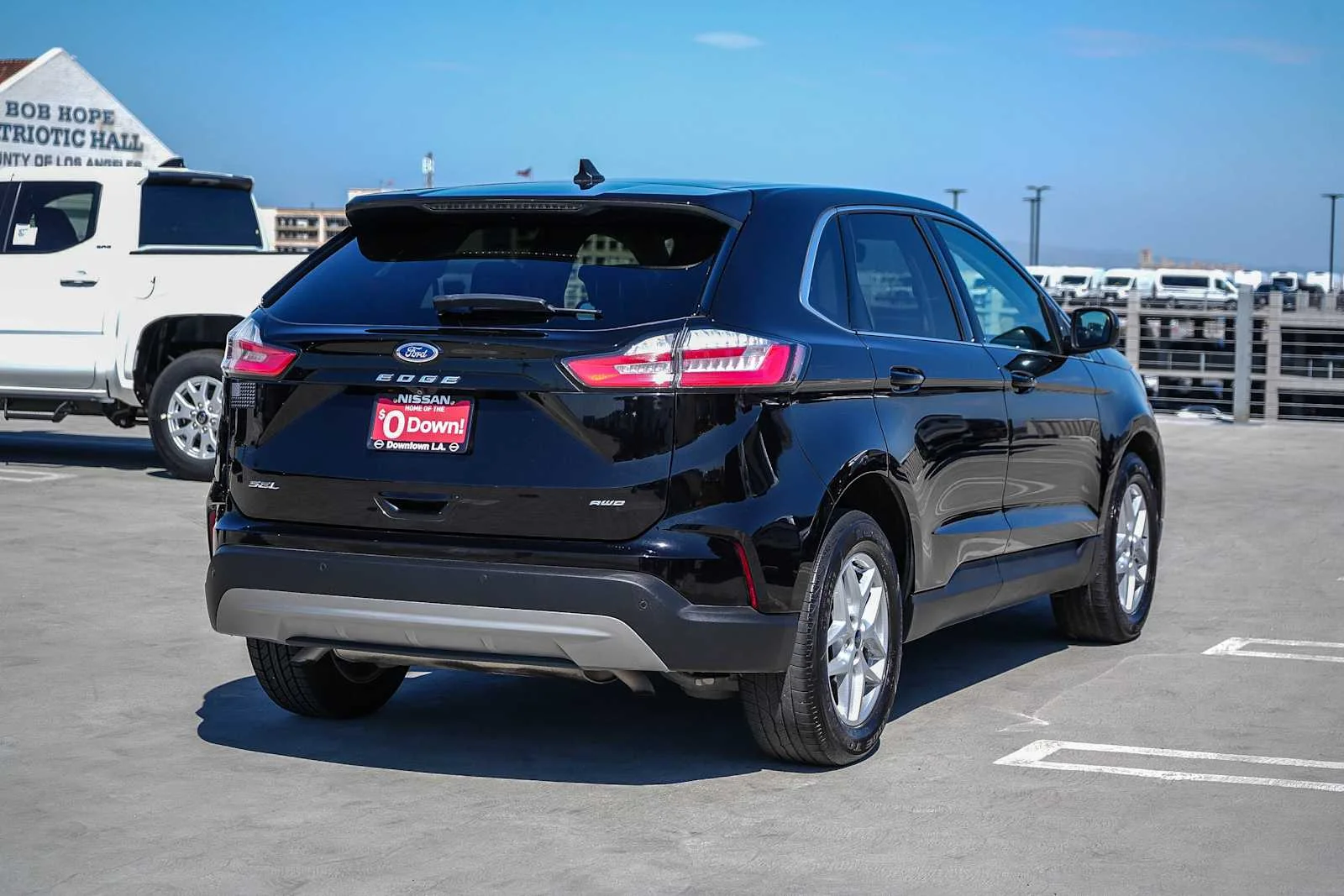 Used 2021 Agate Black Metallic Ford SEL image 7