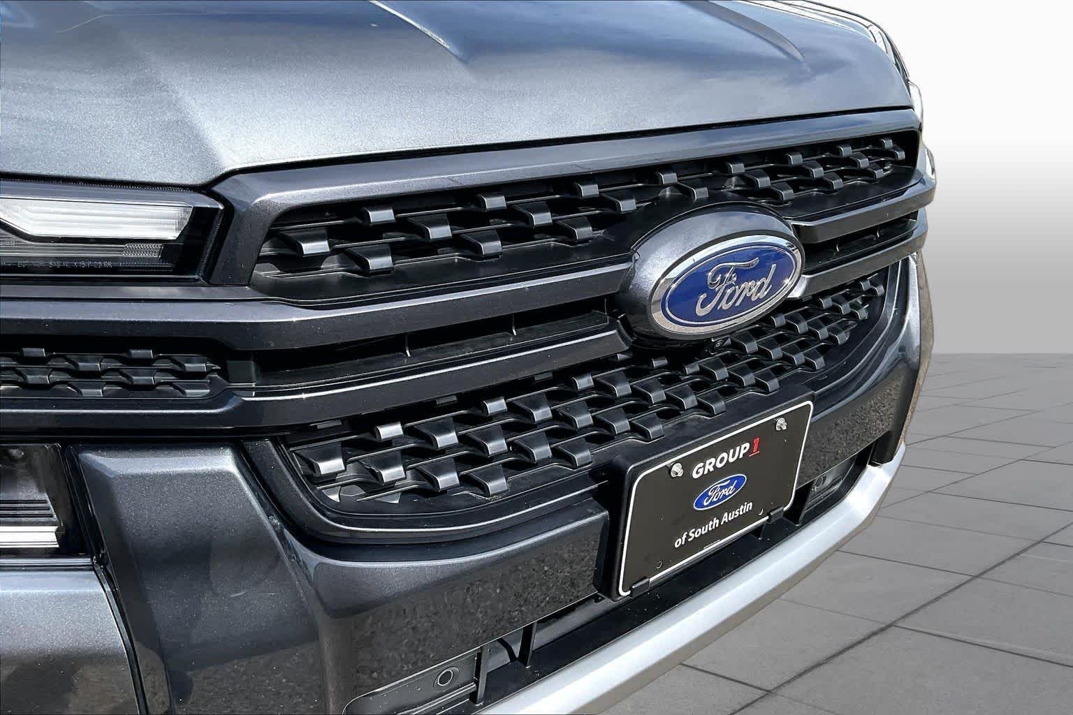 Used 2024 Carbonized Gray Ford LARIAT image 30