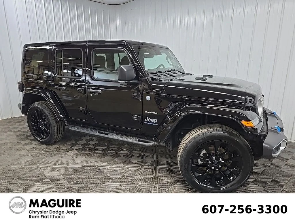 Used 2024 Black Jeep Sahara 4xe image 1