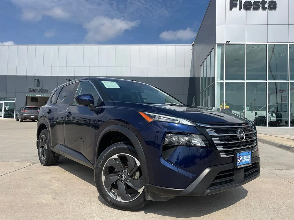 Used 2024 Blue Nissan SV image 1