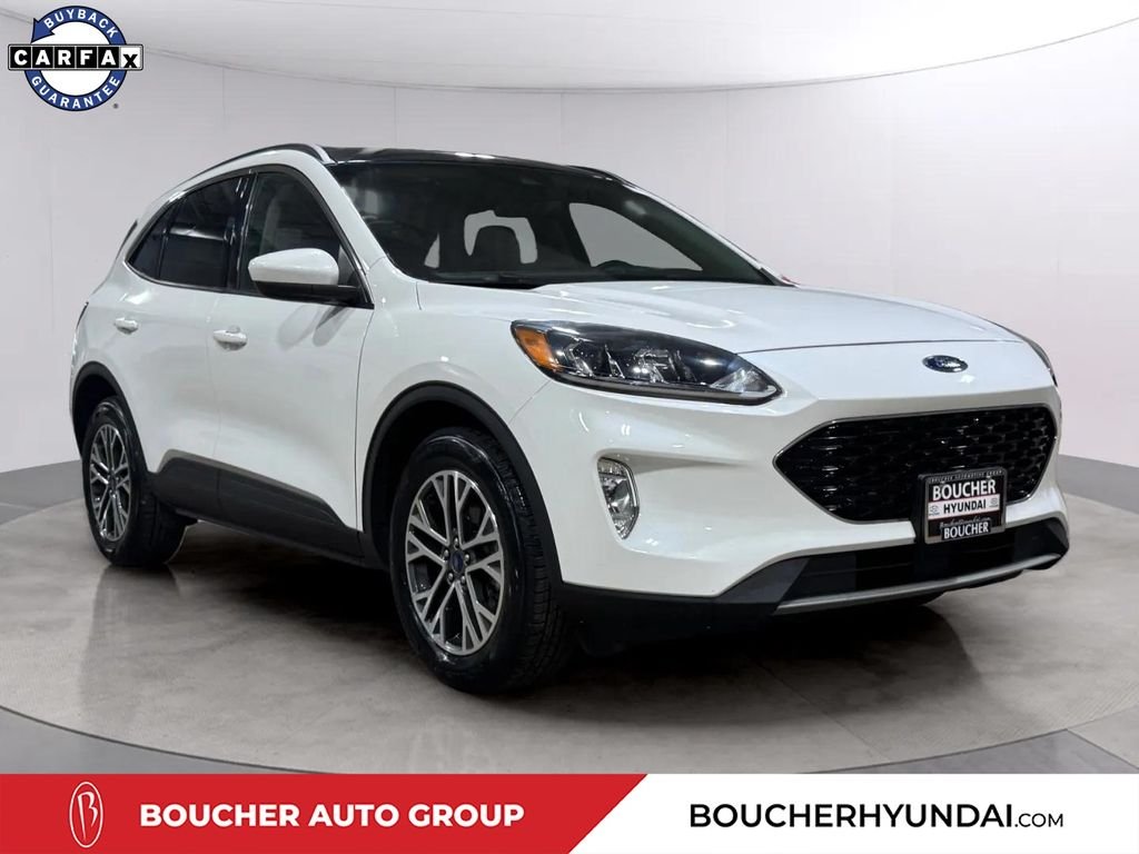 Used 2020 White Metallic Ford SEL image 1