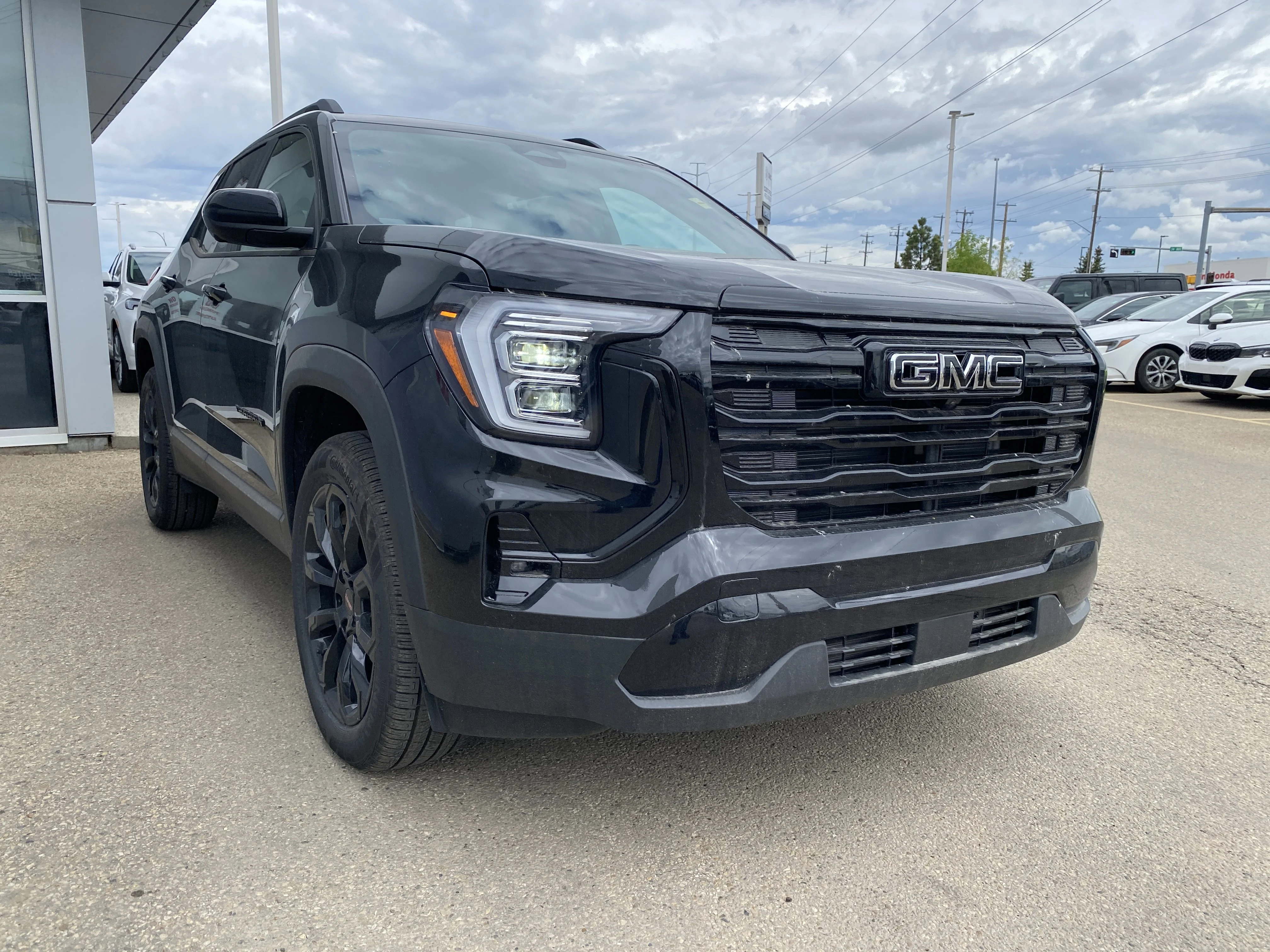 New 2026 EBONY TWILIGHT METALLIC GMC AWD Elevation image 8
