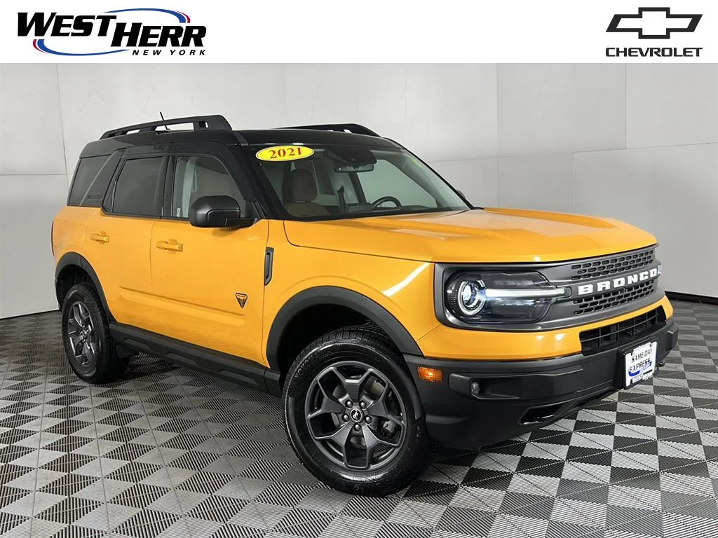 Used 2021 Orange Metallic Ford Badlands image 1