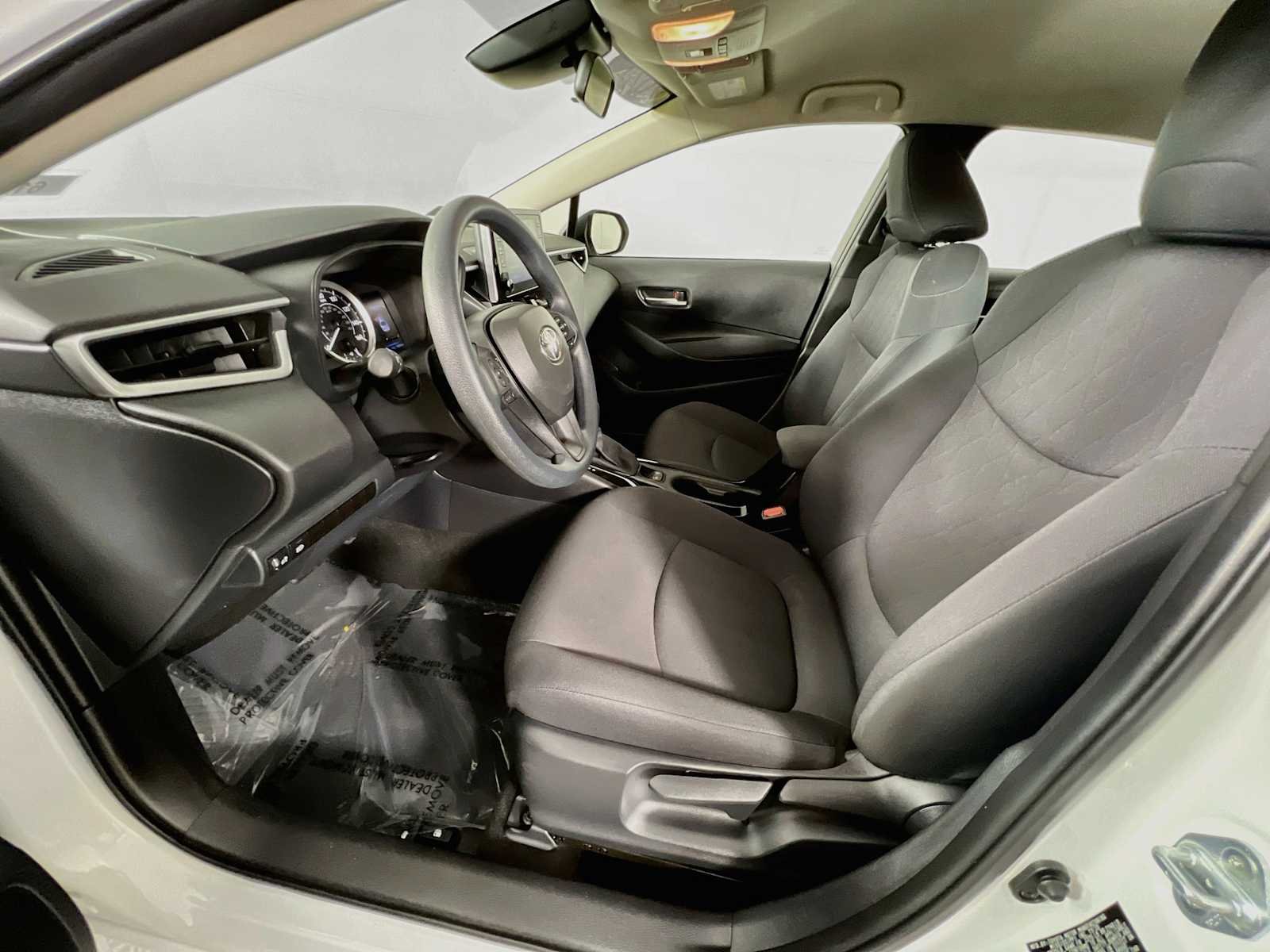 Used 2021 Super White Toyota LE image 20