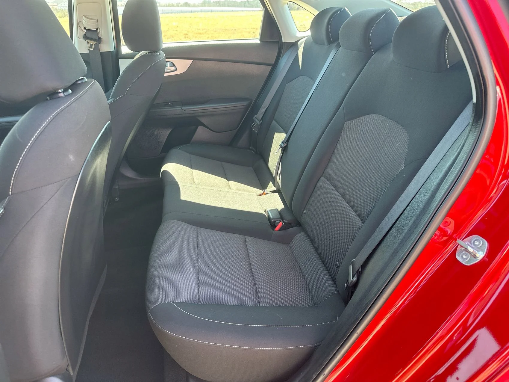 Used 2024 Currant Red Kia LXS image 20