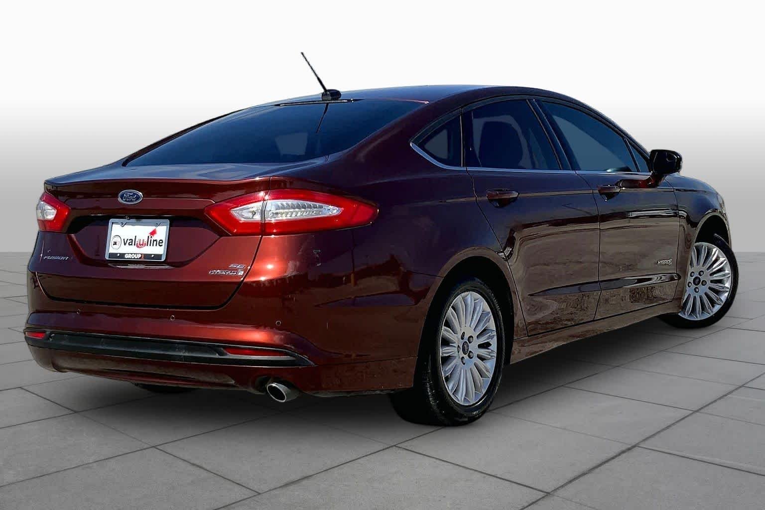 Used 2016 Bronze Fire Metallic Tinted Clearcoat Ford SE Hybrid image 13