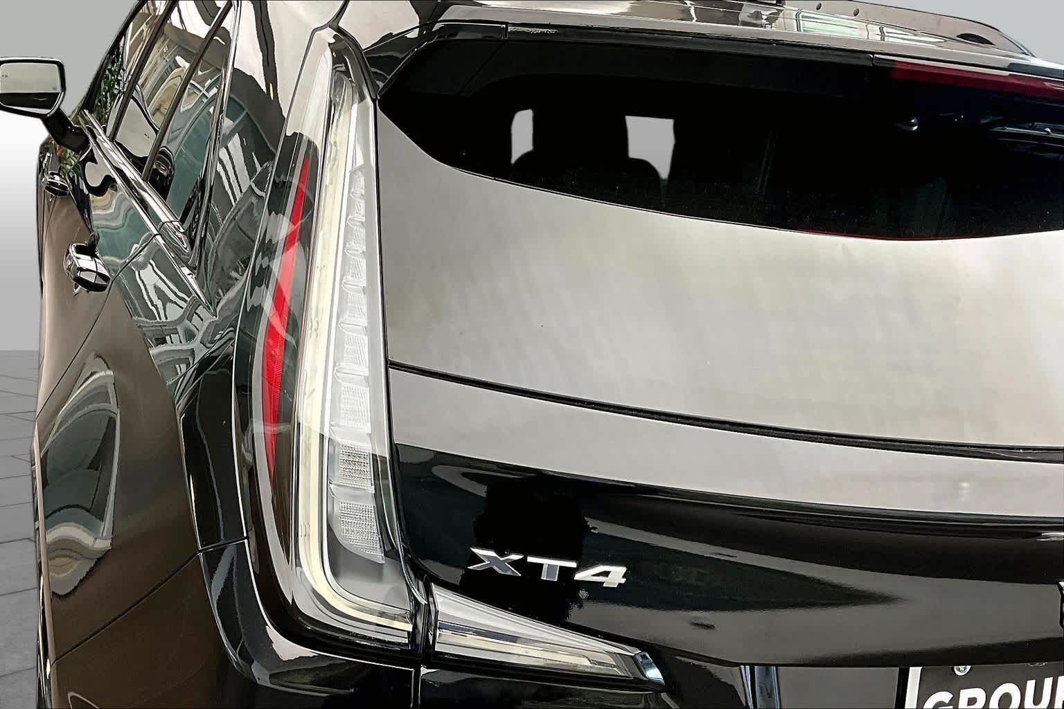 Used 2024 Stellar Black Metallic Cadillac FWD Sport image 28