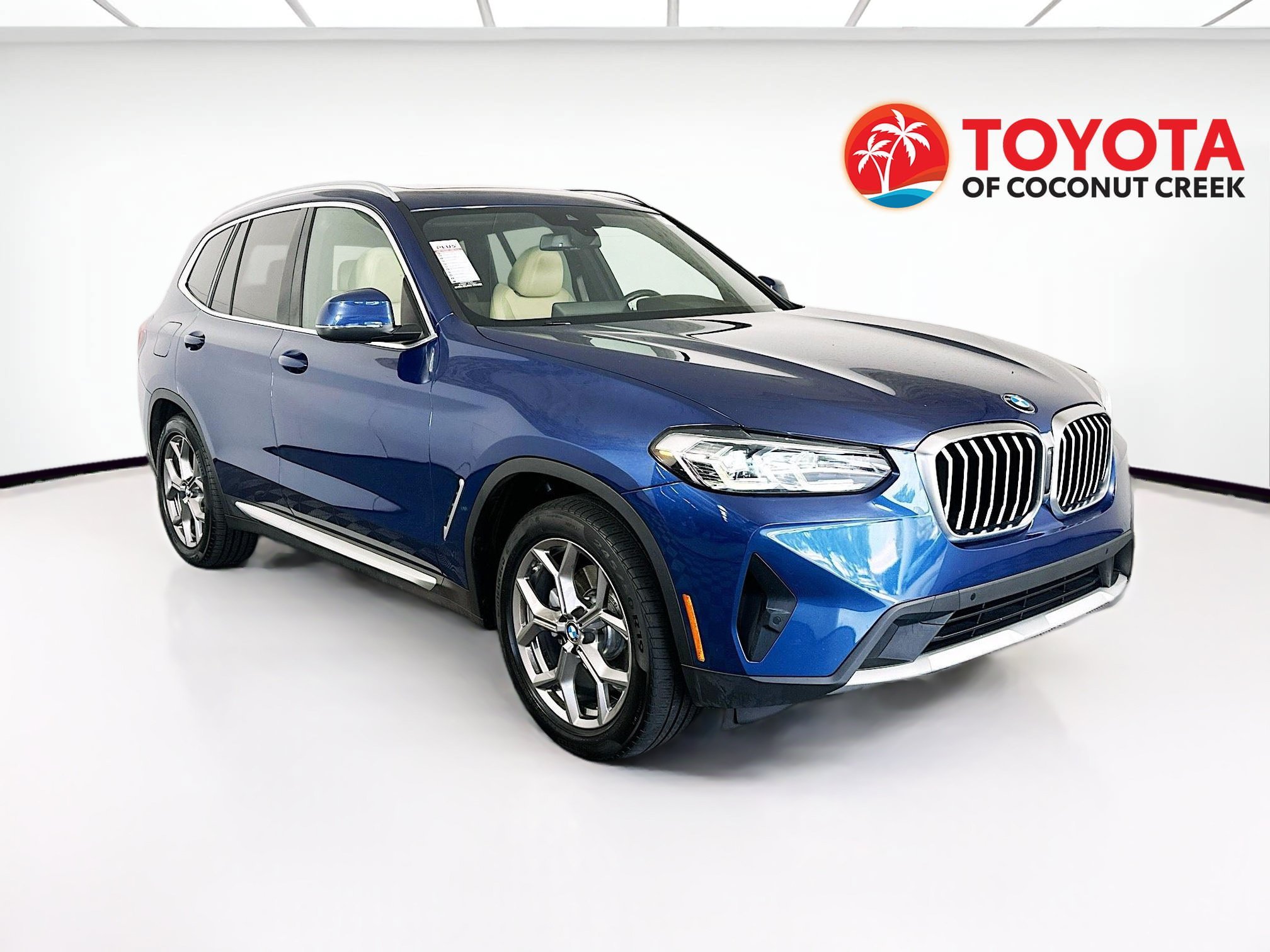 Used 2022 Phytonic Blue Metallic BMW xDrive30i image 1