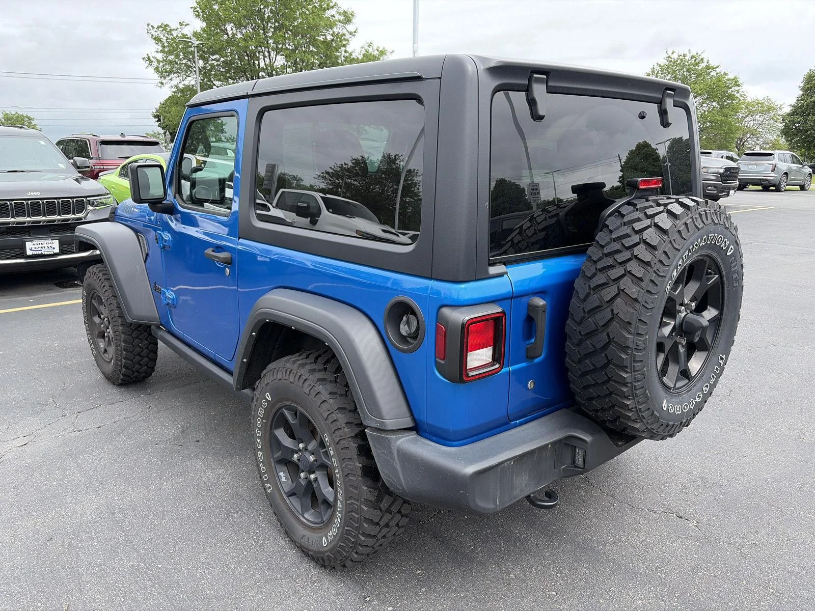 Used 2021 Hydro Blue Pearlcoat Jeep Willys Sport image 4
