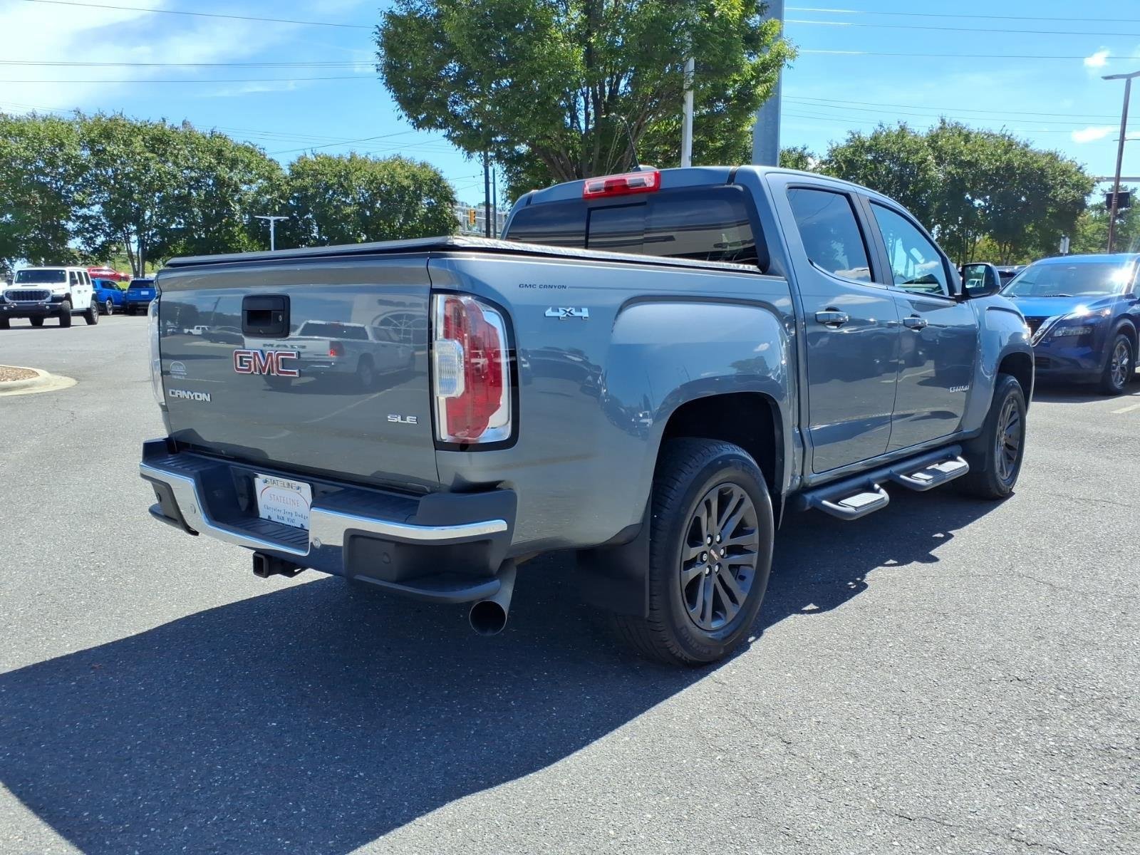 Used 2019 Quicksilver Metallic GMC 4WD SLE image 2