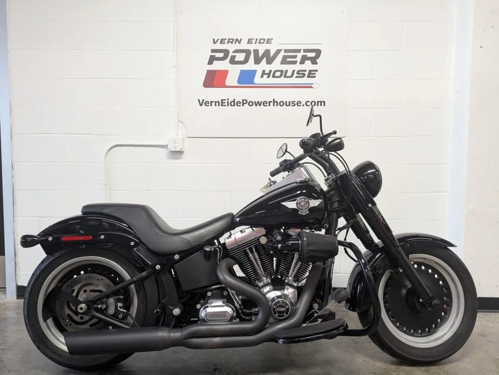 Used 2015 VIVID BLACK Harley-Davidson® FLSTFB - Fat Boy Lo image 1