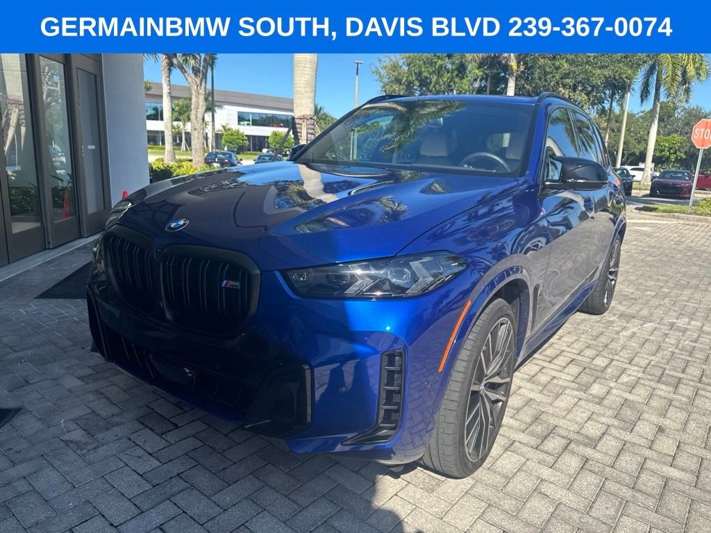 Certified Used 2026 Blue Metallic BMW M60i image 1