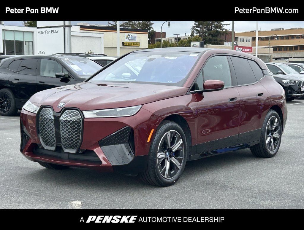 Certified Used 2024 Red Metallic BMW xDrive50 image 1