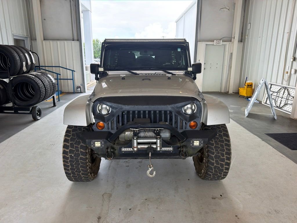Used 2012 Bright Silver Metallic Clearcoat Jeep Sahara image 3