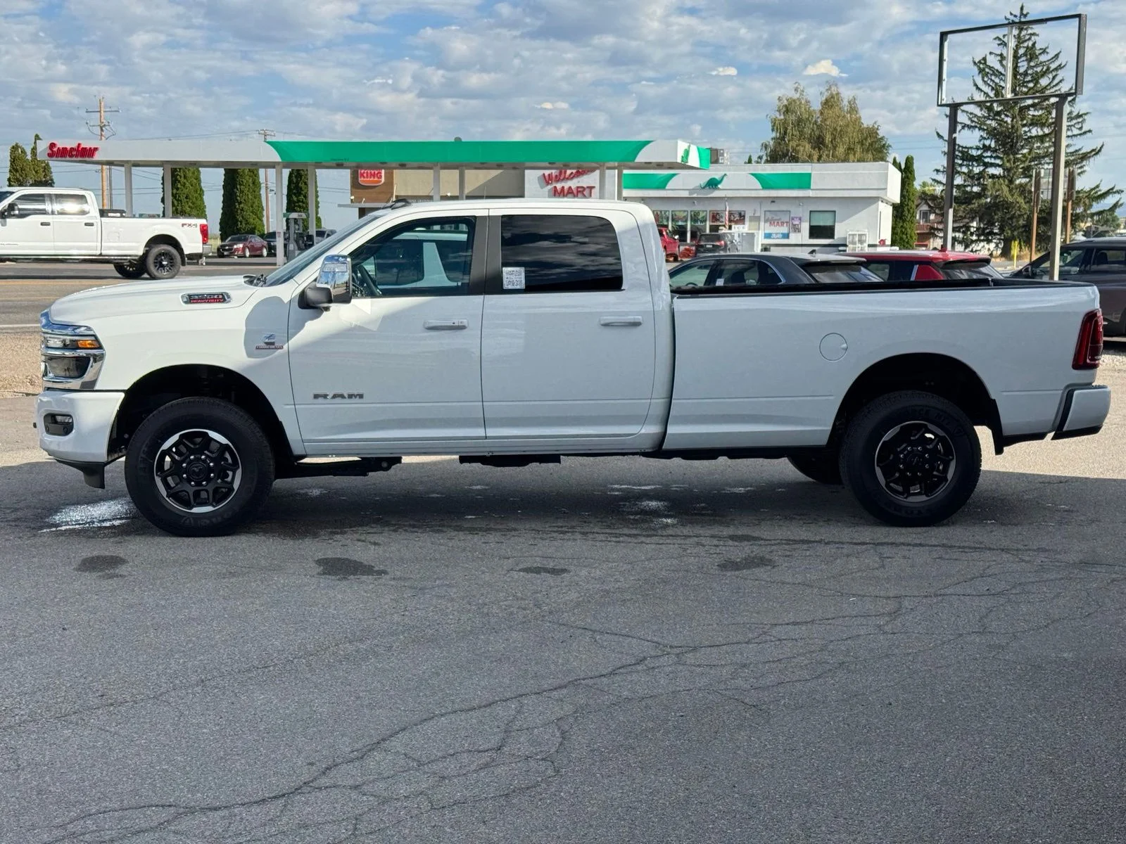 New 2026 Bright White Clear-Coat Exterior Paint RAM Laramie image 12