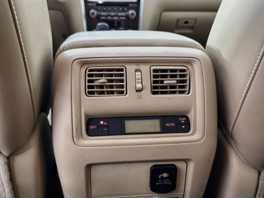 Used 2016 Pearl White Nissan Platinum image 34