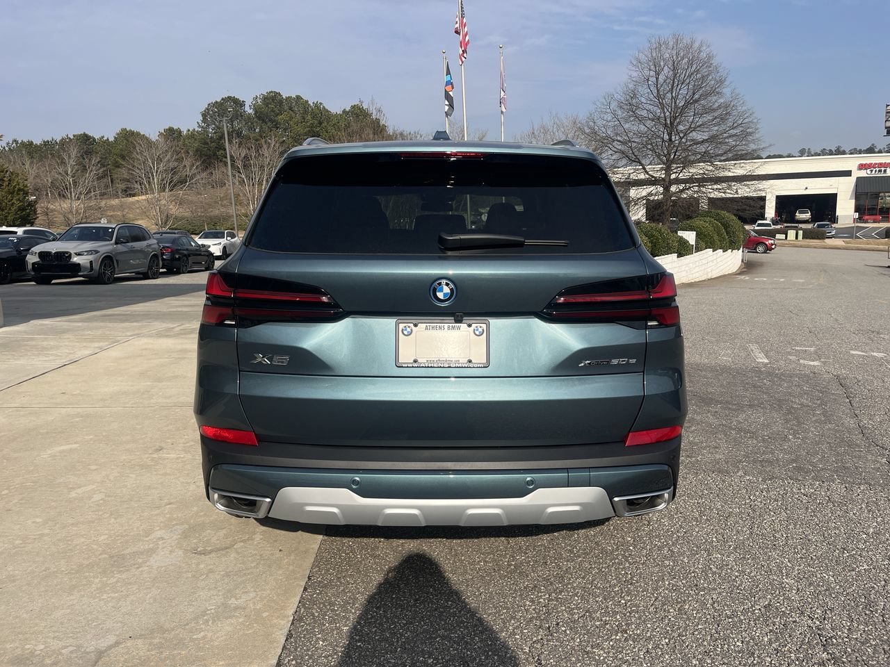 Used 2026 Blue Ridge Mountain Metallic BMW xDrive50e image 7