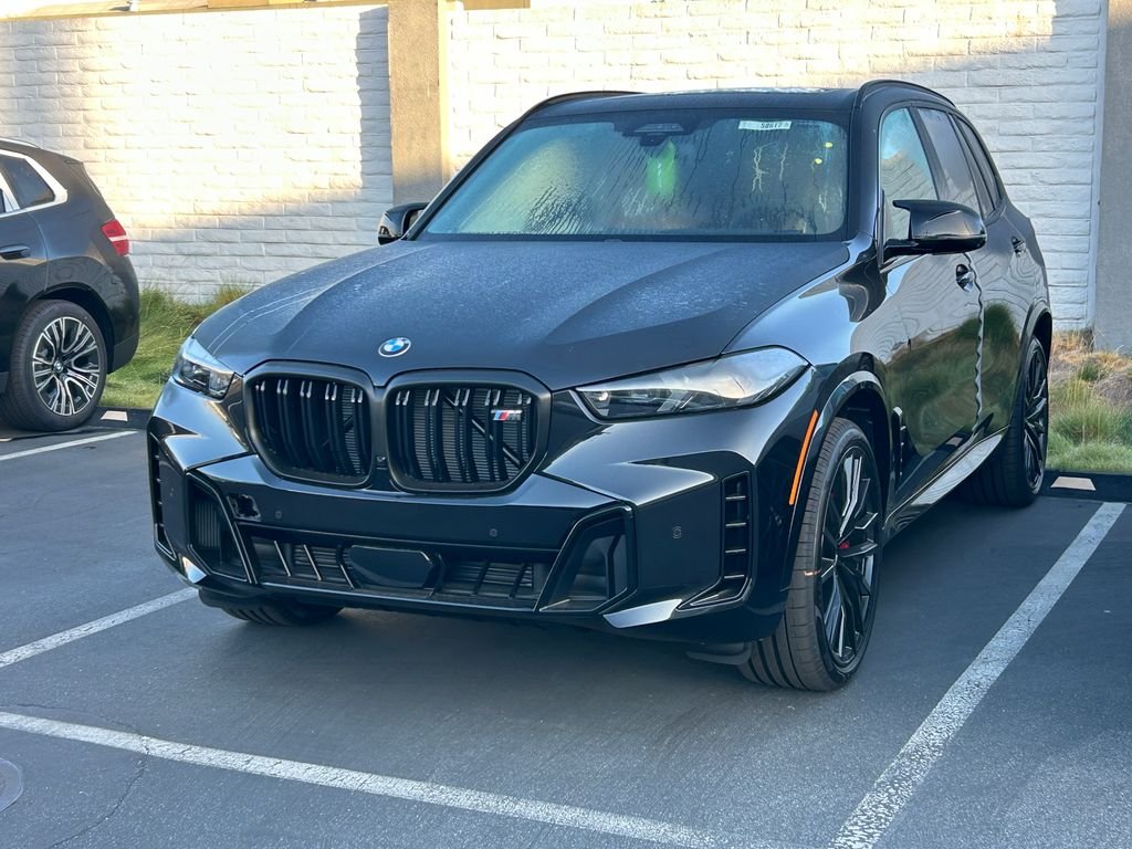 New 2026 Black Sapphire Metallic BMW M60i image 2