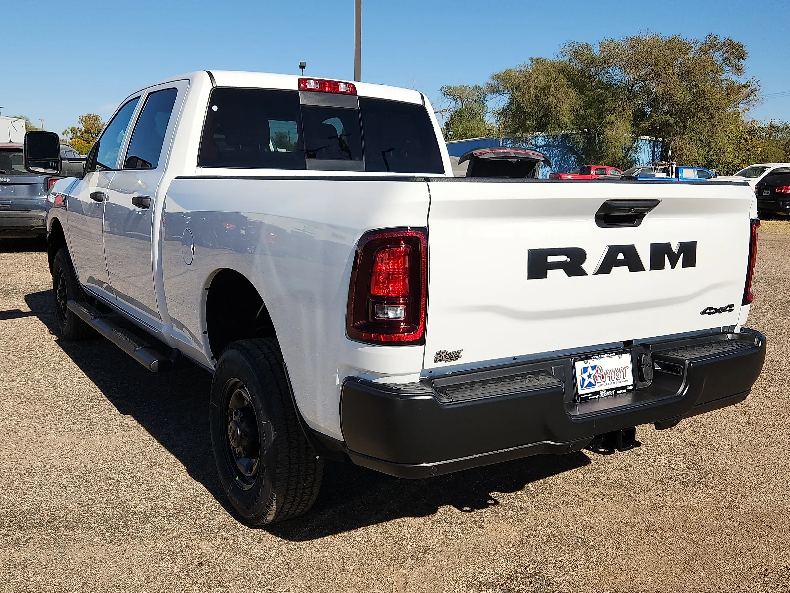 New 2026 PW7 Bright Whit Ram TRADESMAN CREW CAB 4X4 6