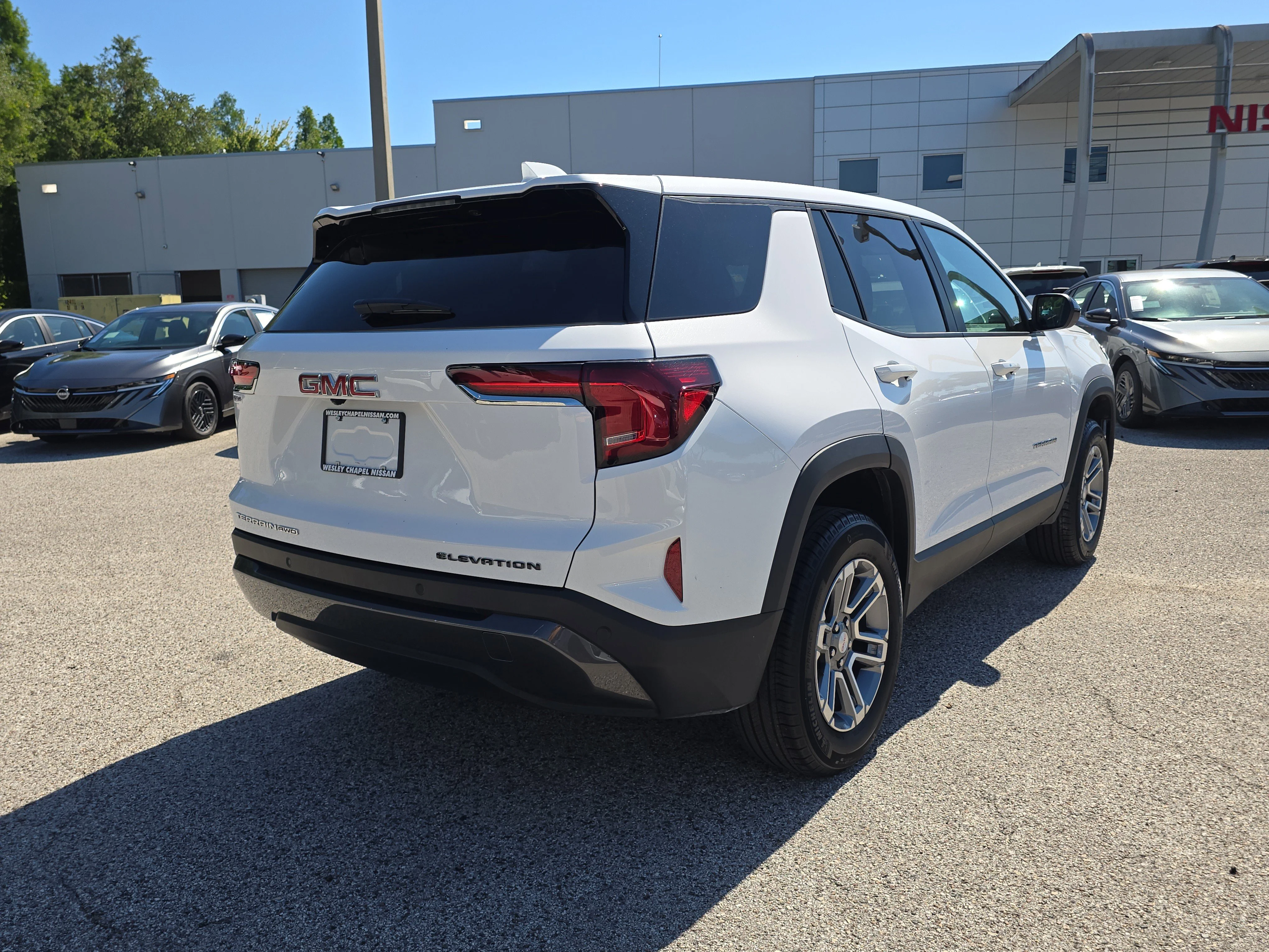 Used 2025 Summit White GMC AWD Elevation image 8