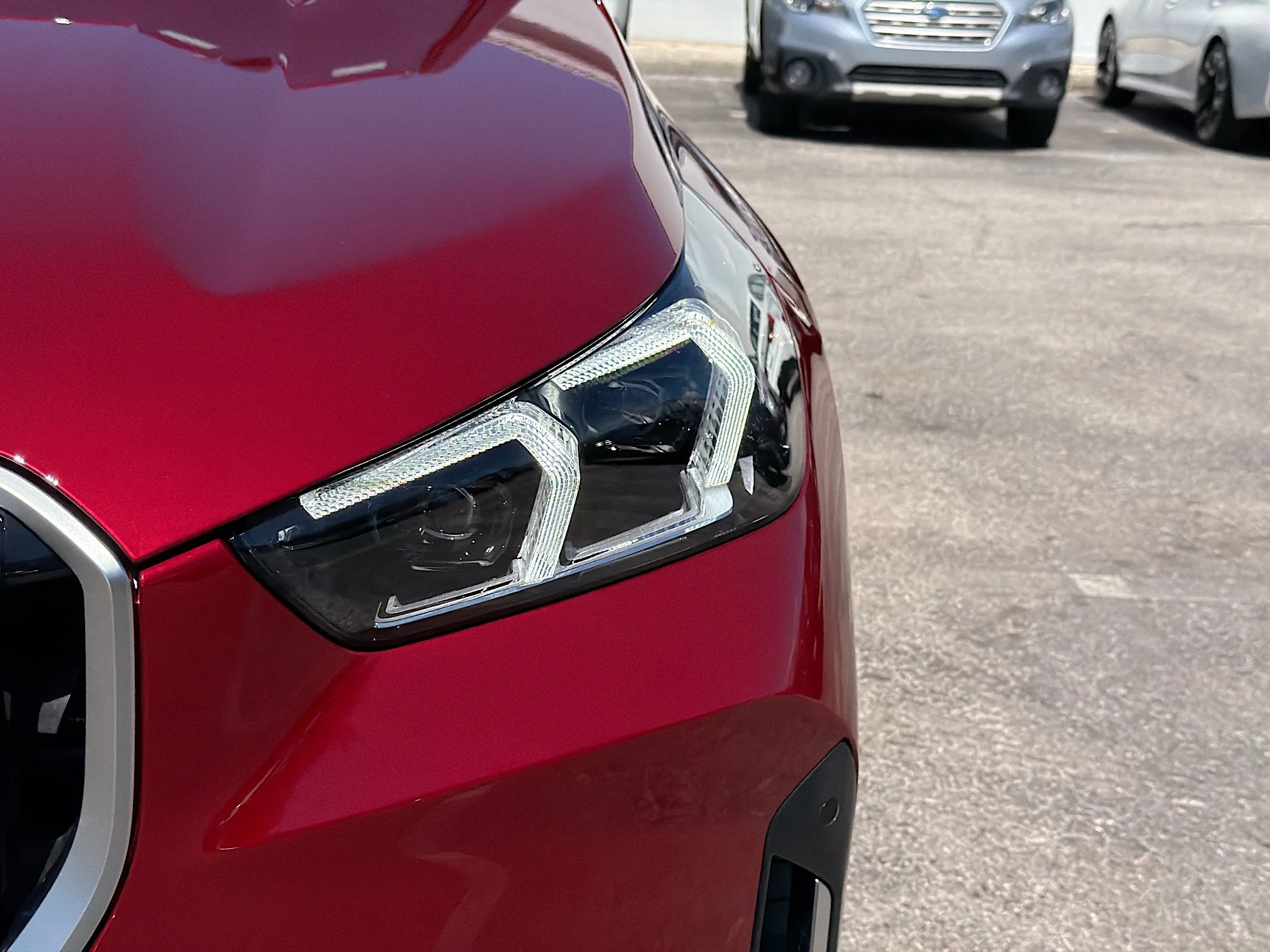 New 2026 Vegas Red Metallic BMW xDrive28i image 9