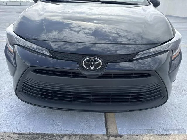 Used 2025 Midnight Black Metallic Toyota LE image 12