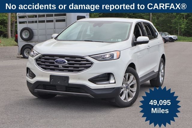 Used 2022 White Ford Titanium image 1