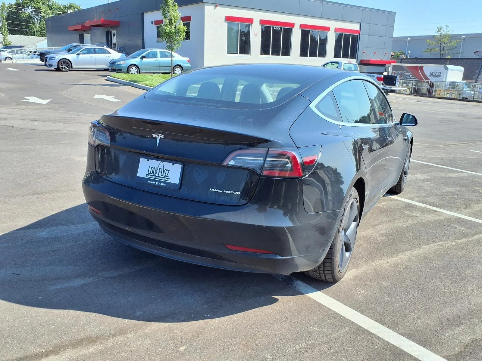 Used 2019 Solid Black Tesla Performance image 4