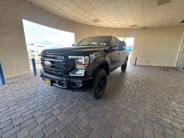 Used 2022 Black Metallic Ford Lariat image 1