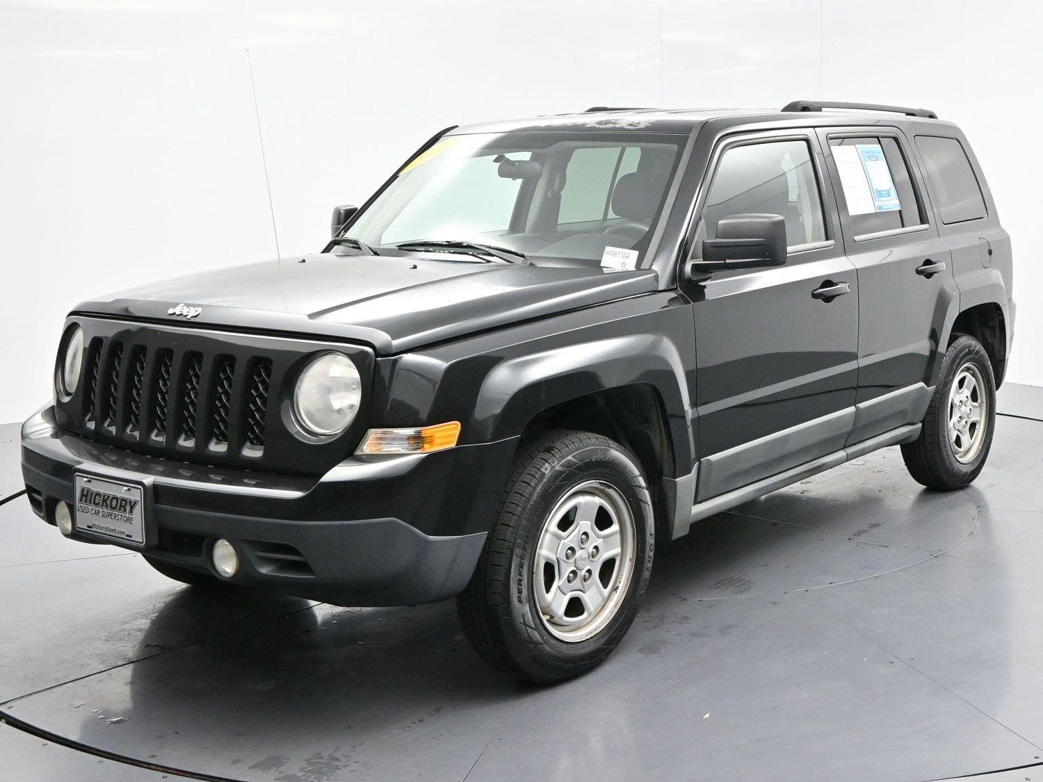 Used 2011 Brilliant Black Crystal Pearl Jeep Sport image 3