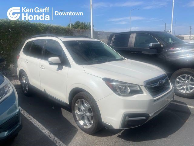 Used 2017 Crystal White Pearl Subaru Touring image 1