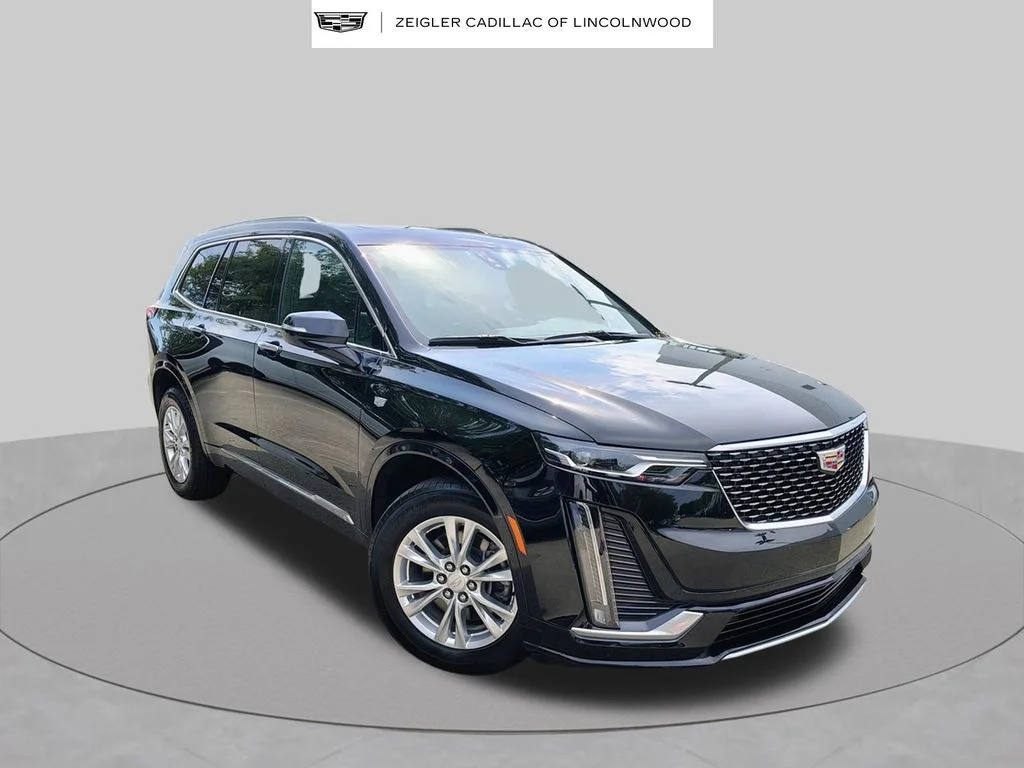 Used 2024 Black Cadillac Luxury image 1