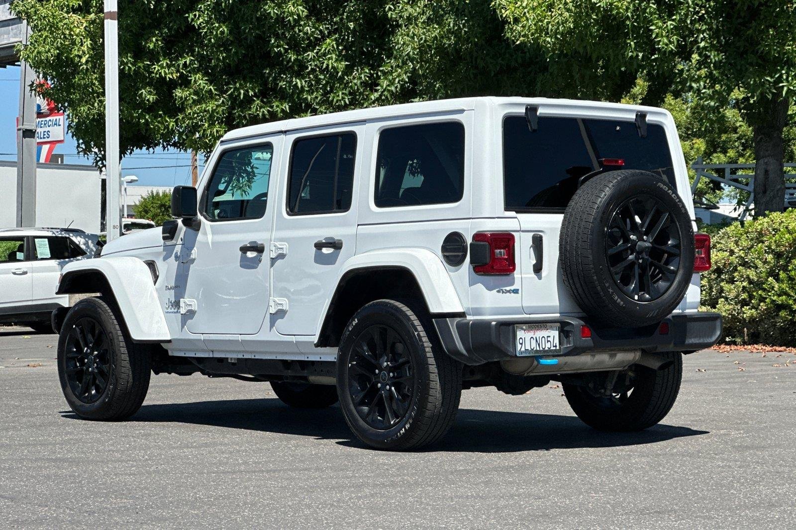 Used 2024 Bright White Clearcoat Jeep Sahara image 6