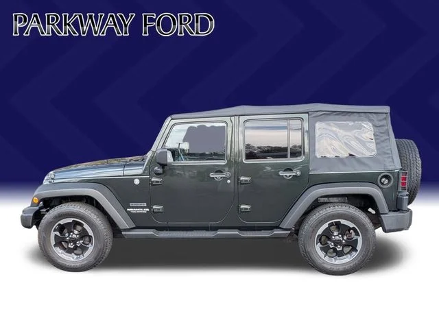 Used 2011 Green Jeep Unlimited Sport image 8