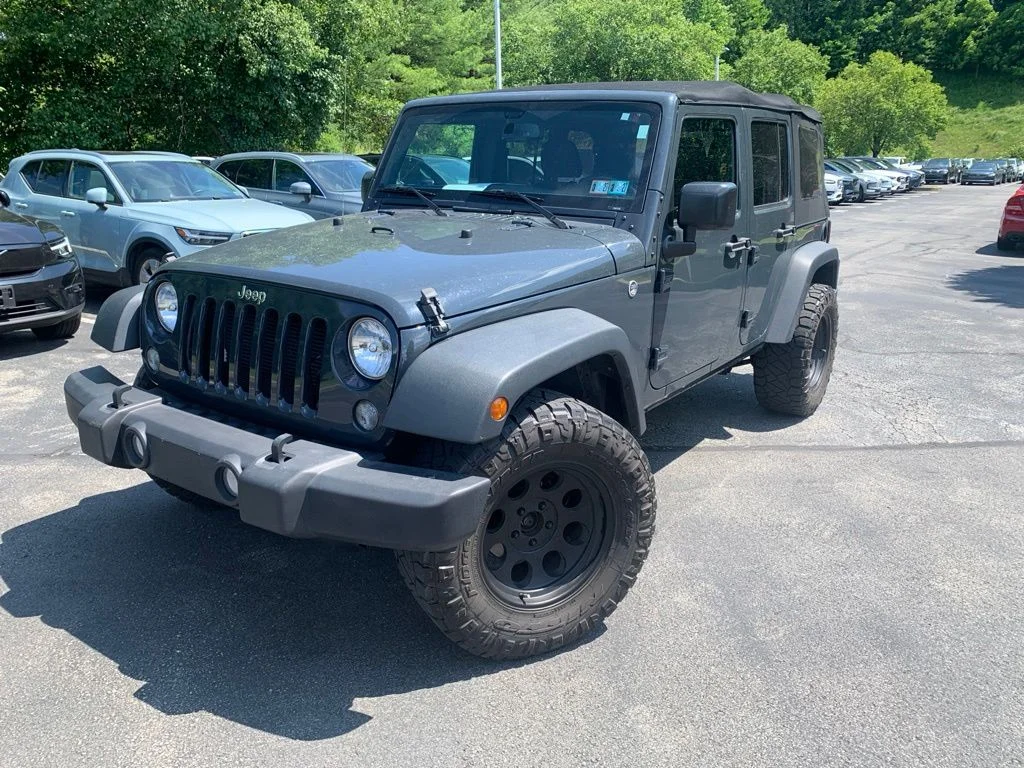 Used 2017 Black Jeep Unlimited Sport image 1