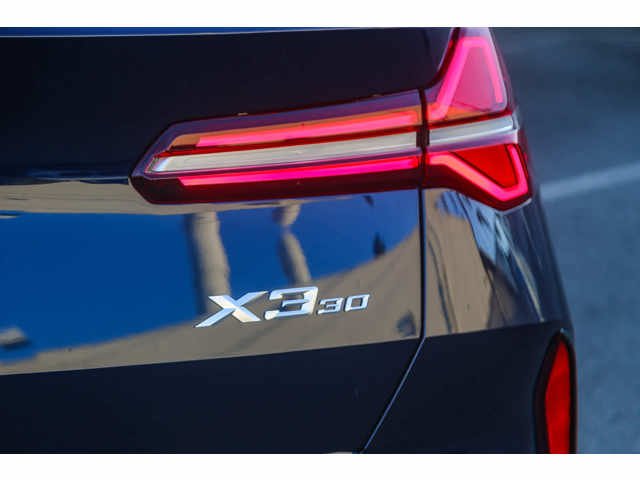 Used 2026 Tanzanite Blue II Metallic BMW 30 xDrive image 7