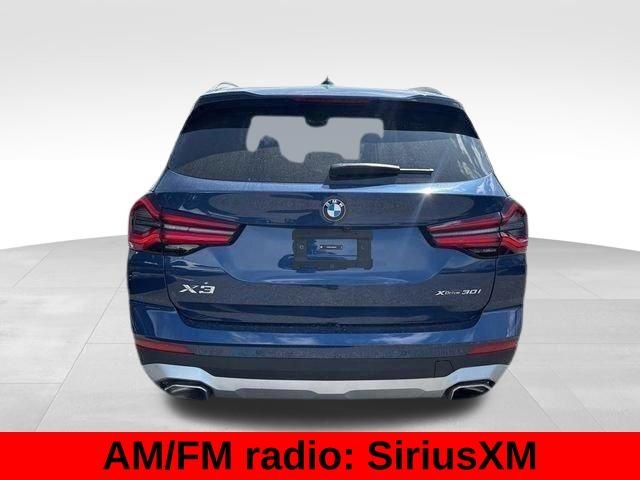 Used 2024 Blue Metallic BMW xDrive30i image 22
