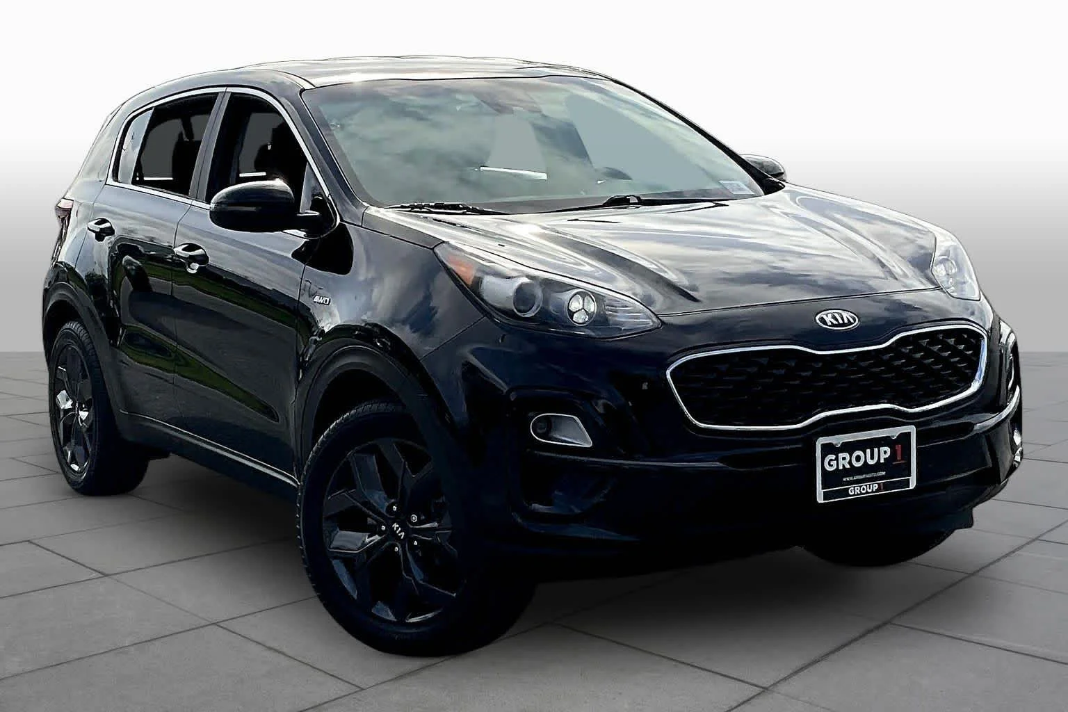 Used 2022 Black Cherry Kia LX image 5