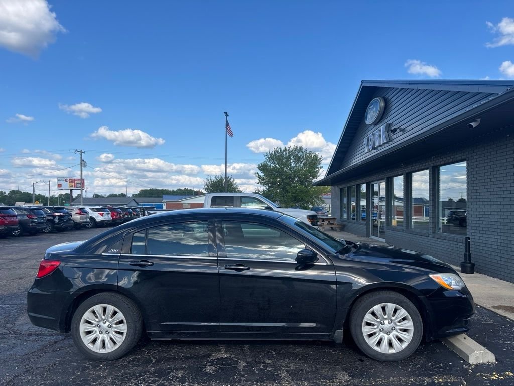 Used 2012 Black Clearcoat Chrysler LX image 4